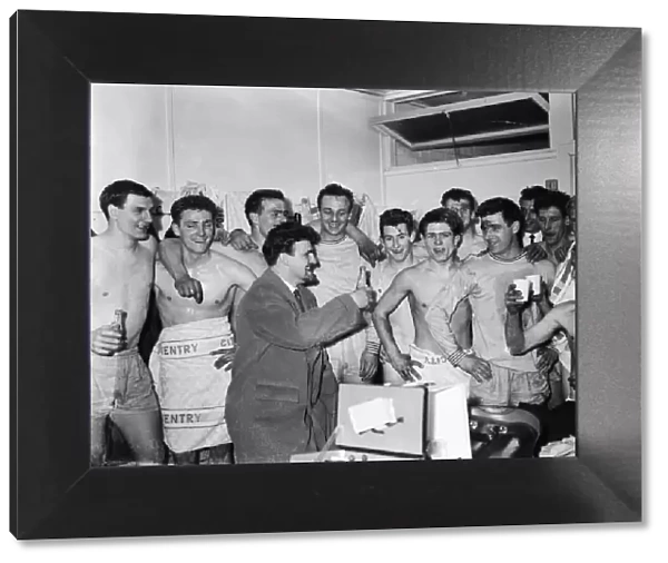 Coventry City manager Jimmy Hill celebrates with the team after drawing 2 - 2 with