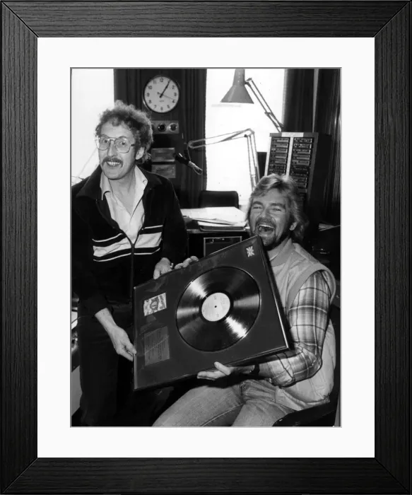 Framed Print : Folk singer Fred Wedlock with DJ Noel Edmonds. With gold record. Circa 1981 Framed Print : Folk singer Fred Wedlock with DJ Noel Edmonds. With gold record. Circa 1981