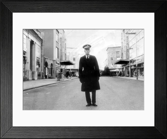 Framed Print : Bristol. A traffic warden surveys a traffic free Broadmead in 1973 as the road becomes a