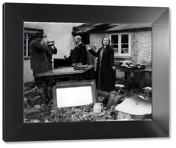 Almondsbury residents with their few remaining possessions following the bombing raid