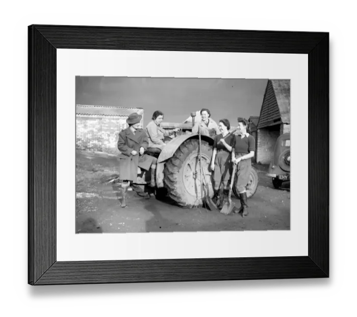 Framed Print : Womens Land Army girls with a tractor probably taken on farms in North Somerset