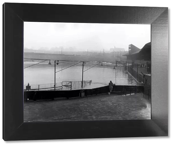 The pitch at Eastville Stadium, Bristol, completely flooded in 1974