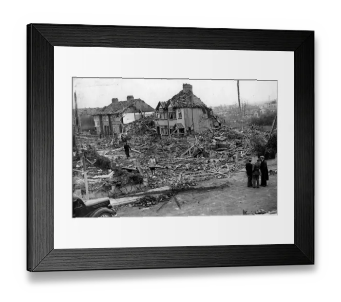 Framed Print : Residents of a bombed-out road in Henleaze recover clothing
