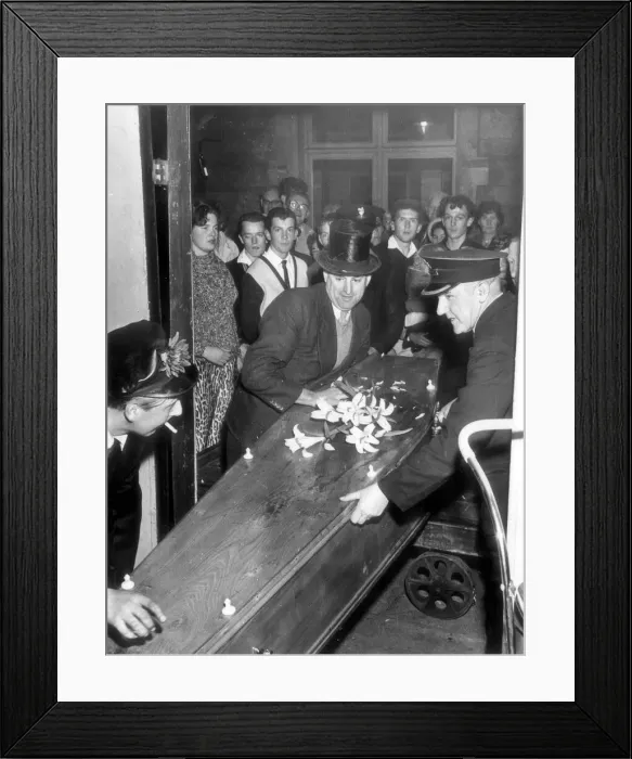 Framed Print : A mock funeral, complete with coffin, for the last passenger train on the Wells to