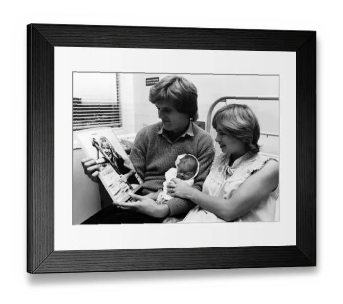 Framed Print : Footballer Gordon McQueen with his wife Yvonne and their new born daughter Hayley McQueen