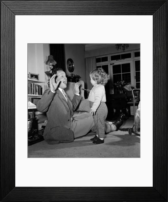 Framed Print : TV Personality Nicholas Parsons and daughter Zuleika. 25th February 1960 Framed Print : TV Personality Nicholas Parsons and daughter Zuleika. 25th February 1960