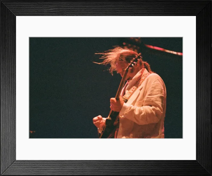 Framed Print : Neil Young performing at The Reading Festival, England, Sunday 27th August 1995 Framed Print : Neil Young performing at The Reading Festival, England, Sunday 27th August 1995
