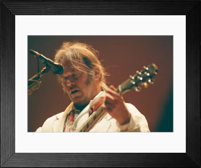 Framed Print : Neil Young performing at The Reading Festival, England, Sunday 27th August 1995 Framed Print : Neil Young performing at The Reading Festival, England, Sunday 27th August 1995