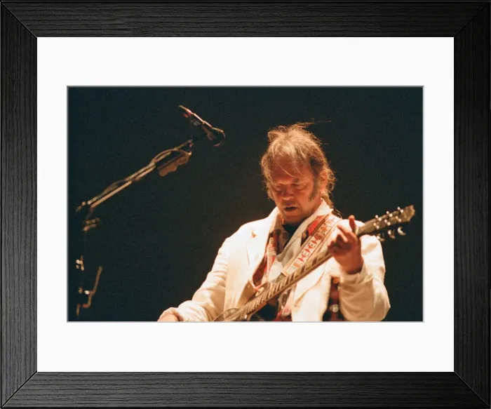 Framed Print : Neil Young performing at The Reading Festival, England, Sunday 27th August 1995 Framed Print : Neil Young performing at The Reading Festival, England, Sunday 27th August 1995