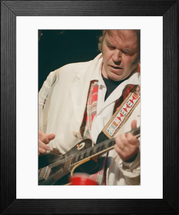 Framed Print : Neil Young performing at The Reading Festival, England, Sunday 27th August 1995 Framed Print : Neil Young performing at The Reading Festival, England, Sunday 27th August 1995