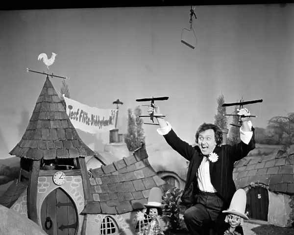Ken Dodd in the Diddy Village with the props for his new children show for the BBC