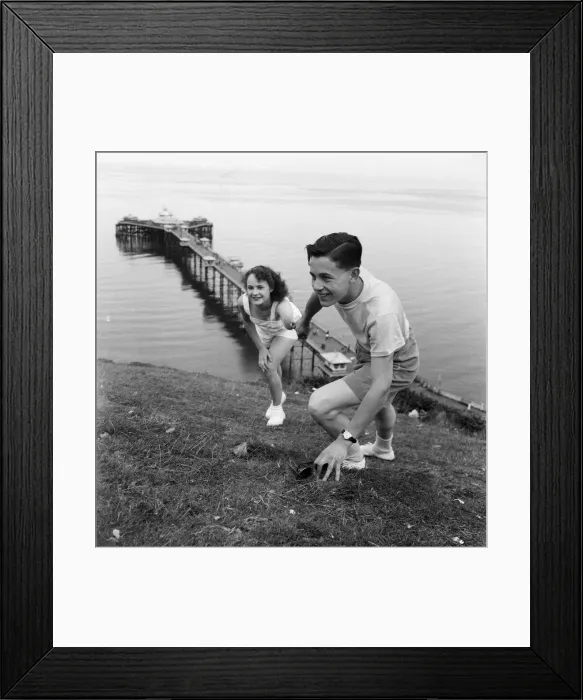 Framed Print : Holiday makers in Llandudno, Conwy County Borough, Clwyd, Wales Framed Print : Holiday makers in Llandudno, Conwy County Borough, Clwyd, Wales