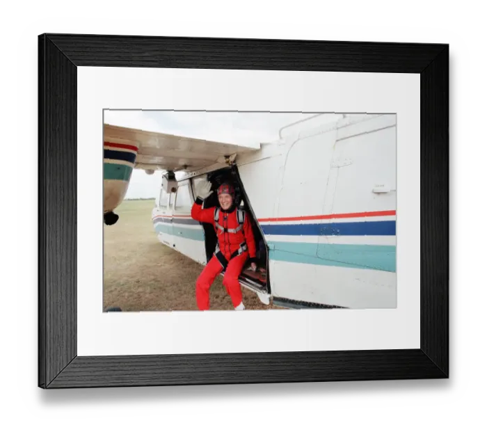Framed Print : Nicholas Parsons, TV Presenter and actor, preparing for a tandem skydive