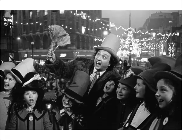 Ken Dodd with his Diddymen after after switching on the Christmas lights in the centre of