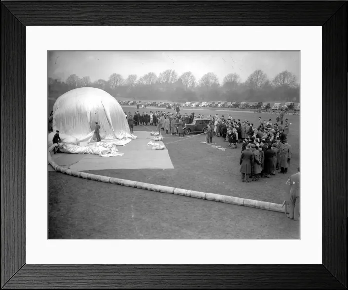 Framed Print : A demonstration of a barrage balloon being inflated on the Downs in 1939 Framed Print : A demonstration of a barrage balloon being inflated on the Downs in 1939