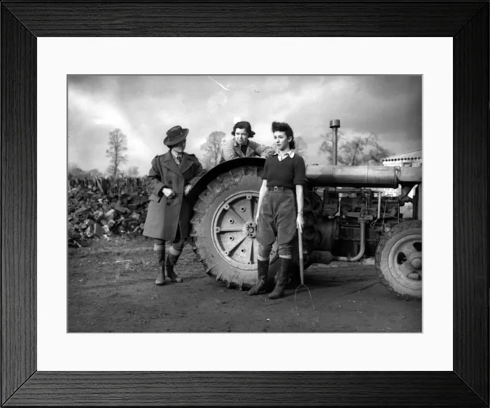 Framed Print : Womens Land Army girls with a tractor probably taken on farms in North Somerset