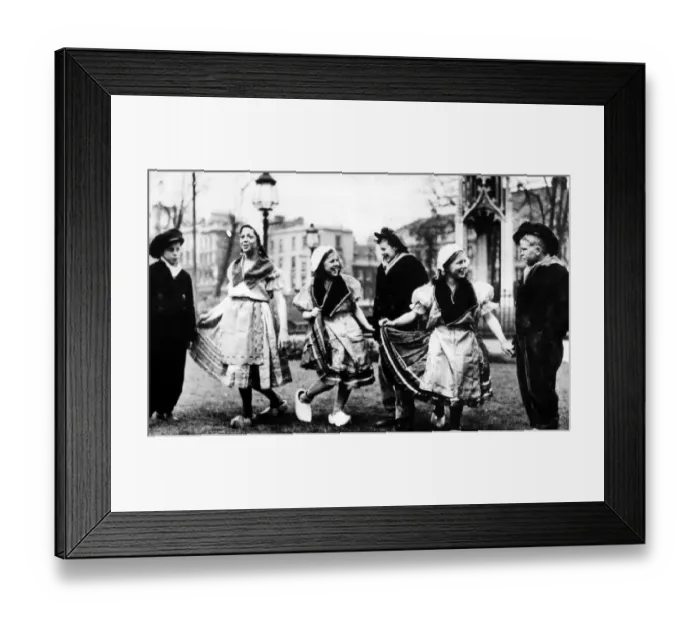 Framed Print : Dutch children dancing on College Green in traditional dress in the mid 1940 Framed Print : Dutch children dancing on College Green in traditional dress in the mid 1940