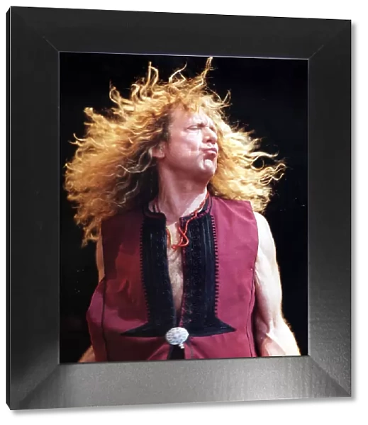 Musician Robert Plant of Led Zepplin seen here on stage. Glastonbury Festival 1995