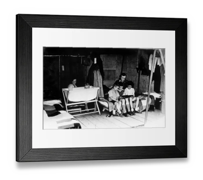 Framed Print : Bath and bedtime at a camp set up to give a break to hard pressed families during Framed Print : Bath and bedtime at a camp set up to give a break to hard pressed families during