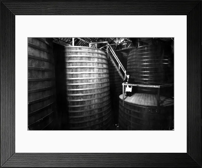 Framed Print : The Tun Room containing oak vats with Brewery Foreman Dan Rodway, 1930 s Framed Print : The Tun Room containing oak vats with Brewery Foreman Dan Rodway, 1930 s