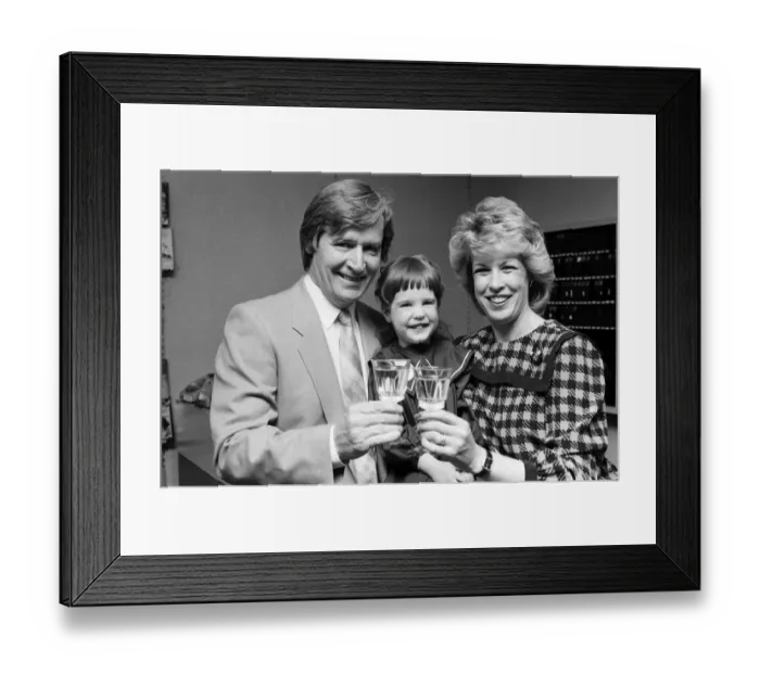 Framed Print : Coronation Street actor William Roache opening a shop in Bolton with his wife Sarah