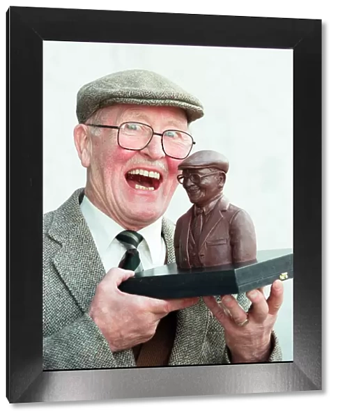 Coronation Street actor Bill Waddington with a chocolate bust of his character Percy