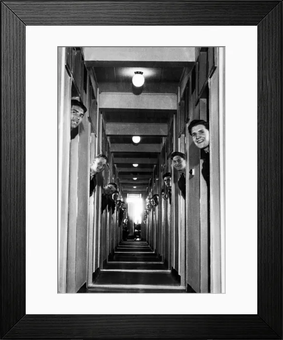 Framed Print : RAF recruits pop their heads out from the doorways of their new room-a-man quarters Framed Print : RAF recruits pop their heads out from the doorways of their new room-a-man quarters