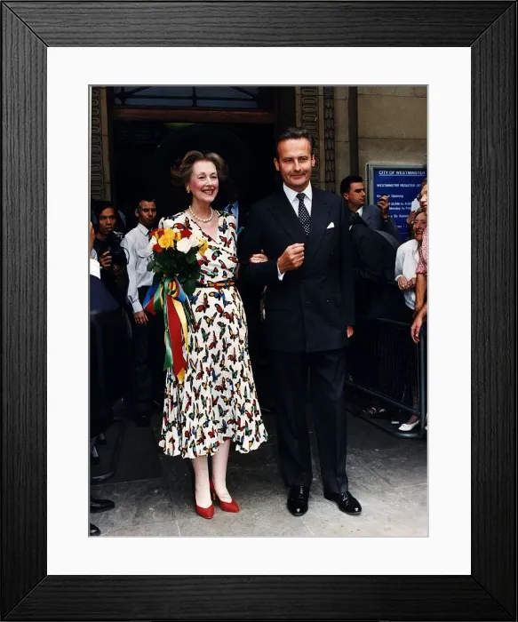 Framed Print : Couple leave after the wedding ceremony which took place at the Westminster Reg Office Framed Print : Couple leave after the wedding ceremony which took place at the Westminster Reg Office