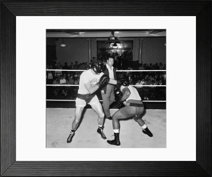 Framed Print : Henry Cooper seen here (left) in training at The Bellingham for his fight against Cassius Framed Print : Henry Cooper seen here (left) in training at The Bellingham for his fight against Cassius