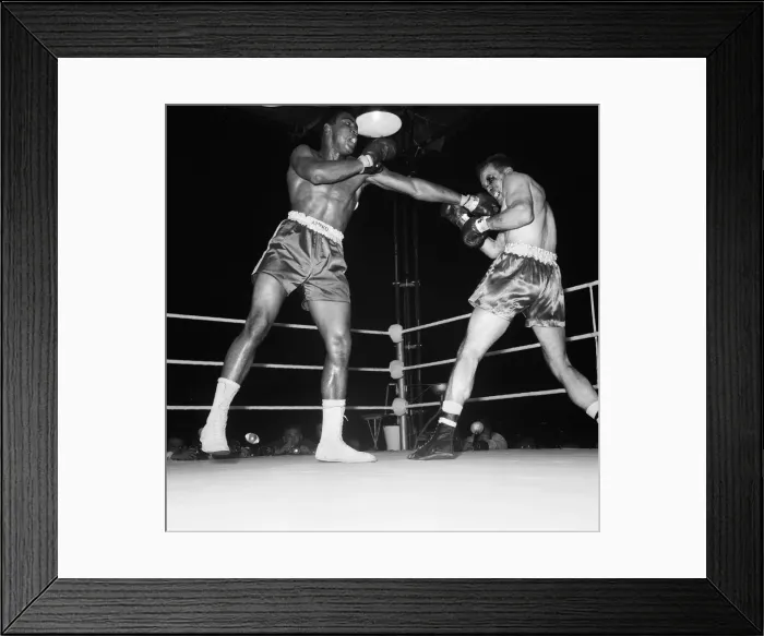 Framed Print : Cassius Clay aka (Muhammad Ali) vs Henry Cooper in their first fight at Wembley Stadium Framed Print : Cassius Clay aka (Muhammad Ali) vs Henry Cooper in their first fight at Wembley Stadium