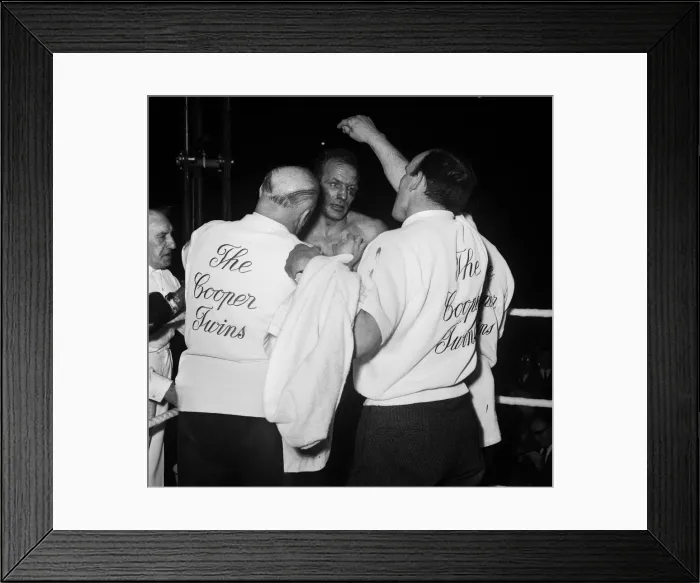Framed Print : Cassius Clay aka (Muhammad Ali) vs Henry Cooper in their first fight at Wembley Stadium Framed Print : Cassius Clay aka (Muhammad Ali) vs Henry Cooper in their first fight at Wembley Stadium