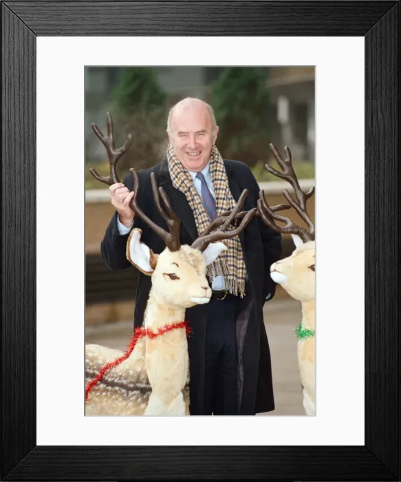 Framed Print : Clive James pictured at the BBC during Christmas time. 6th December 1990 Framed Print : Clive James pictured at the BBC during Christmas time. 6th December 1990