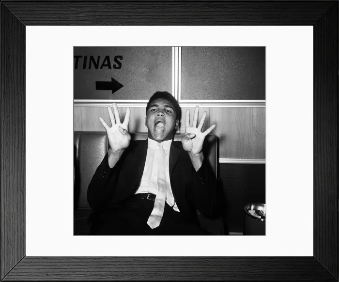 Framed Print : Cassius Clay, aka (Muhammad Ali) on his way back to the United States after beating