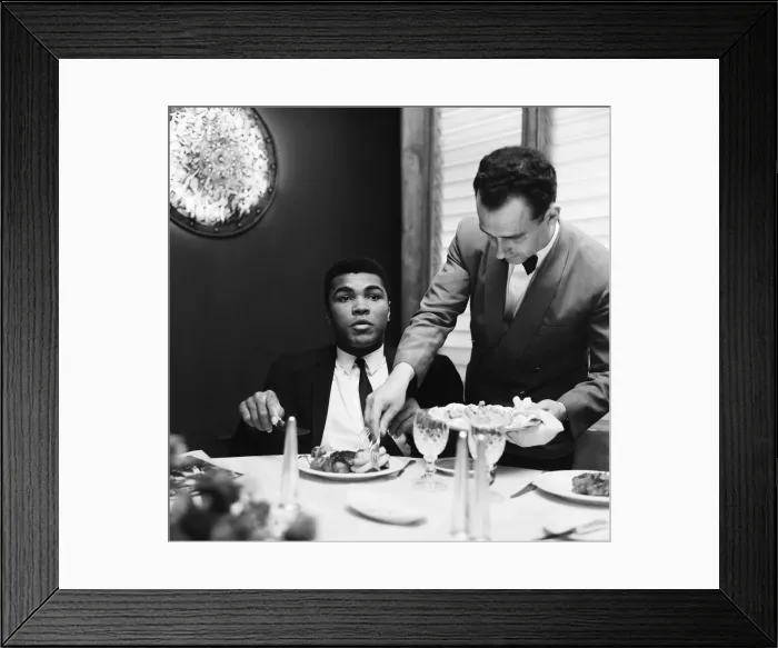 Framed Print : Cassius Clay (Pictured) having lunch in London before his trip to Scotland for an