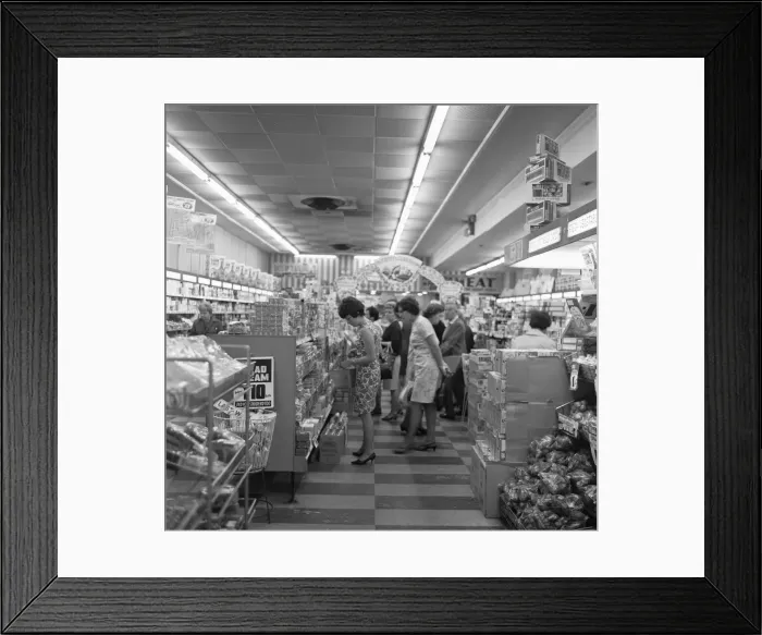 Framed Print : House wives brows the shelves during their weekly shop st the Co-Op supermarket in Framed Print : House wives brows the shelves during their weekly shop st the Co-Op supermarket in
