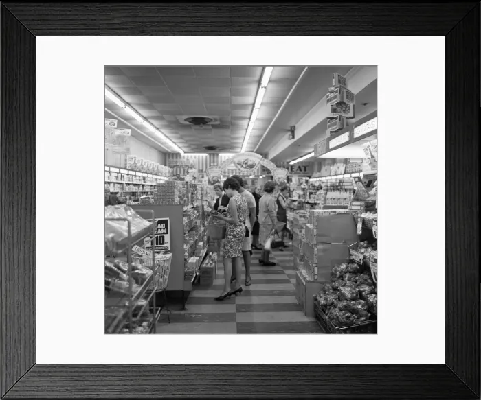 Framed Print : House wives brows the shelves during their weekly shop st the Co-Op supermarket in