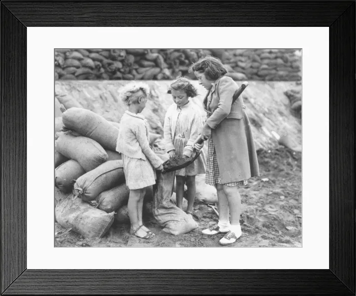 Framed Print : Children filling sandbags in Paignton in September 1939 Framed Print : Children filling sandbags in Paignton in September 1939