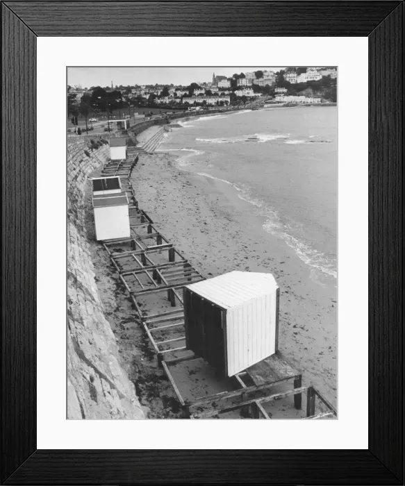 Framed Print : Beach hut tossed aside by the waves in September 1991. Devon