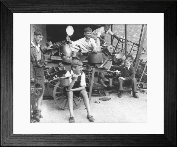 Framed Print : Paignton lads admiring their haul of scrap metal in a school holiday campaign called