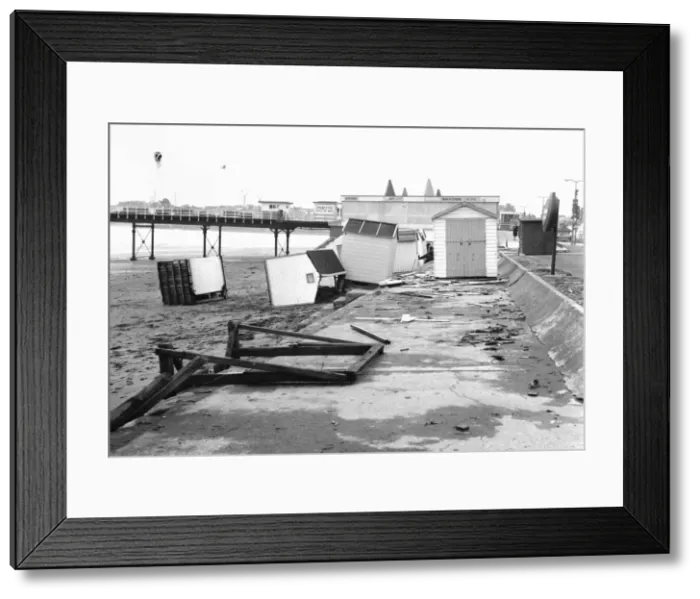 Framed Print : Wrecked beach huts on Paignton beach in March 1973 Framed Print : Wrecked beach huts on Paignton beach in March 1973