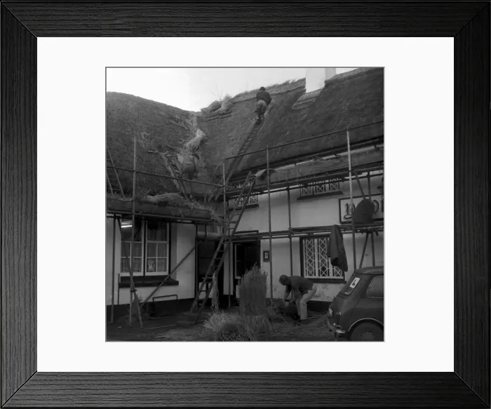 Framed Print : Re-thatching of the Manor Inn at Preston in November 1970 Framed Print : Re-thatching of the Manor Inn at Preston in November 1970