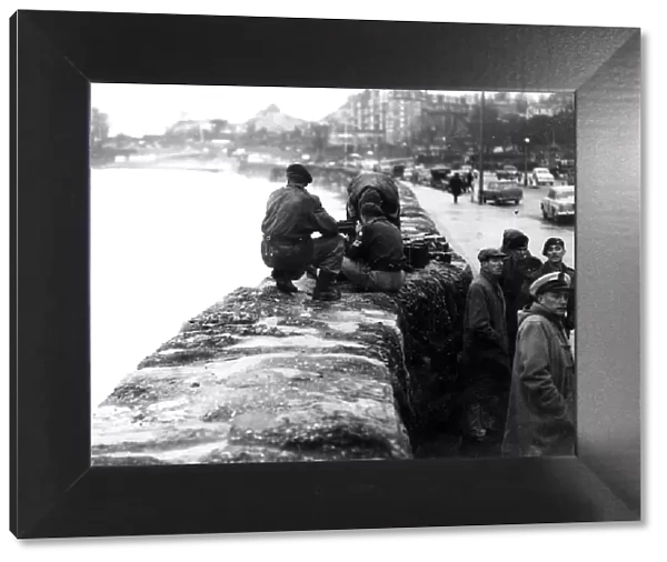 Army gunners attempt to sink a Dutch barge before it damages Torquay harbour in December