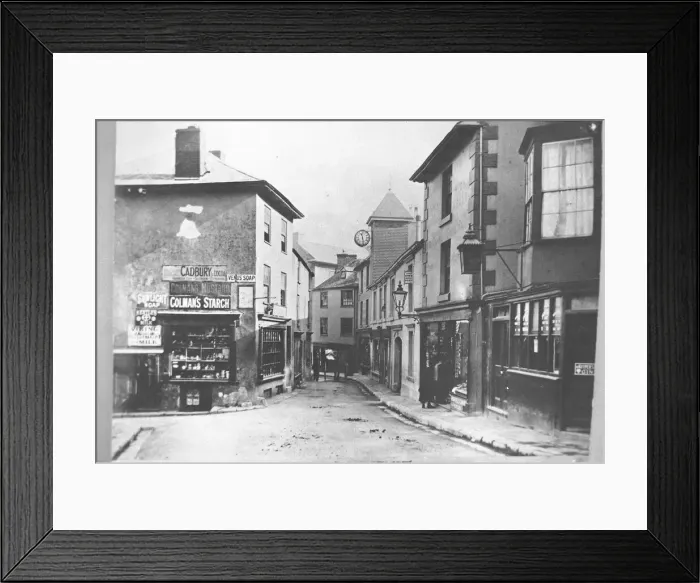 Framed Print : Fore Steet, Brixham, in the early 1900s Framed Print : Fore Steet, Brixham, in the early 1900s