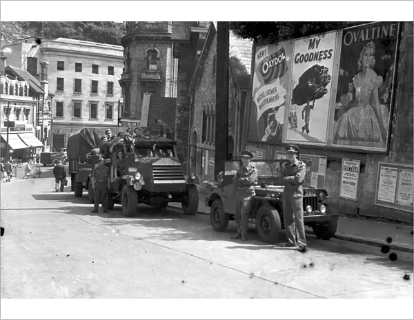 Military vehicles in Abbey Road, Torquay in July 1949. Adverising signs - Ovaltine