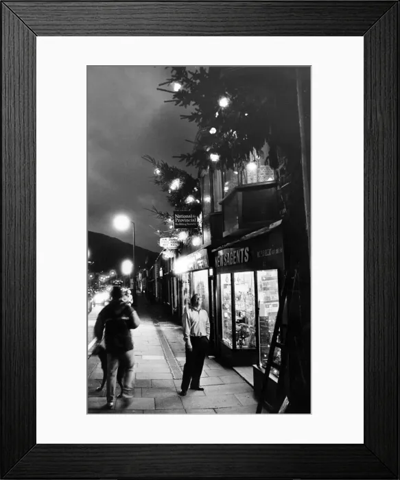 Framed Print : Christmas trees lend a festive air to Ton Pentres main street Framed Print : Christmas trees lend a festive air to Ton Pentres main street