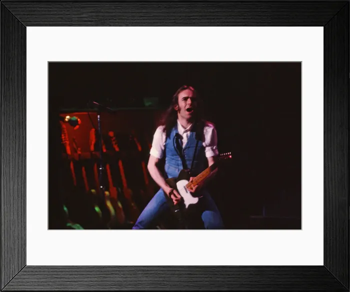 Framed Print : Status Quo, English rock band, onstage in 1981. Picture shows lead singer Framed Print : Status Quo, English rock band, onstage in 1981. Picture shows lead singer