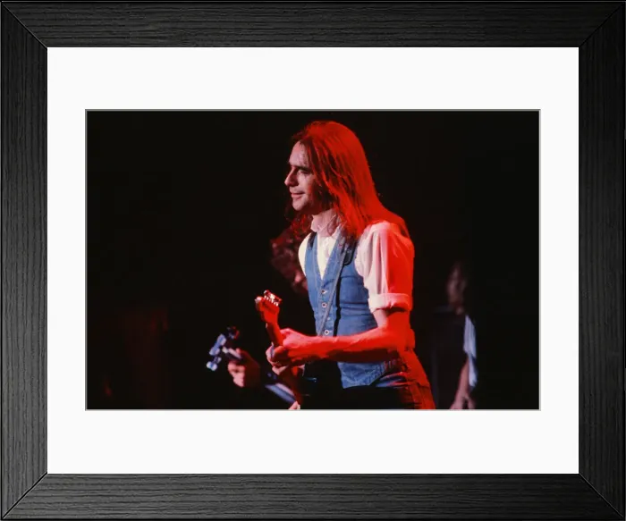 Framed Print : Status Quo, English rock band, onstage in 1981. Picture shows lead singer Framed Print : Status Quo, English rock band, onstage in 1981. Picture shows lead singer