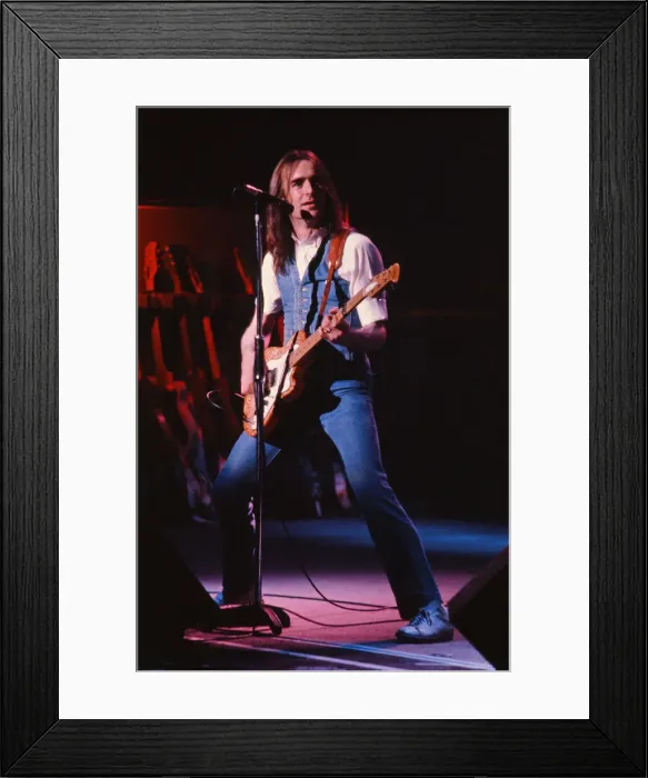 Framed Print : Status Quo, English rock band, onstage in 1981. Picture shows lead singer Framed Print : Status Quo, English rock band, onstage in 1981. Picture shows lead singer