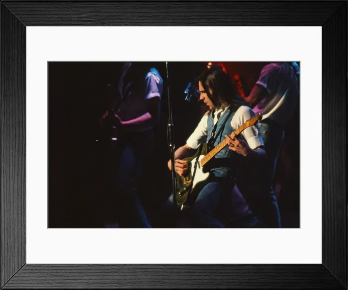 Framed Print : Status Quo, English rock band, onstage in 1981. Picture shows lead singer Framed Print : Status Quo, English rock band, onstage in 1981. Picture shows lead singer