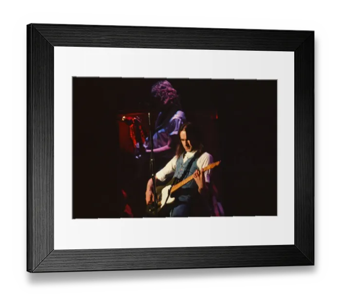 Framed Print : Status Quo, English rock band, onstage in 1981. Picture shows lead singer